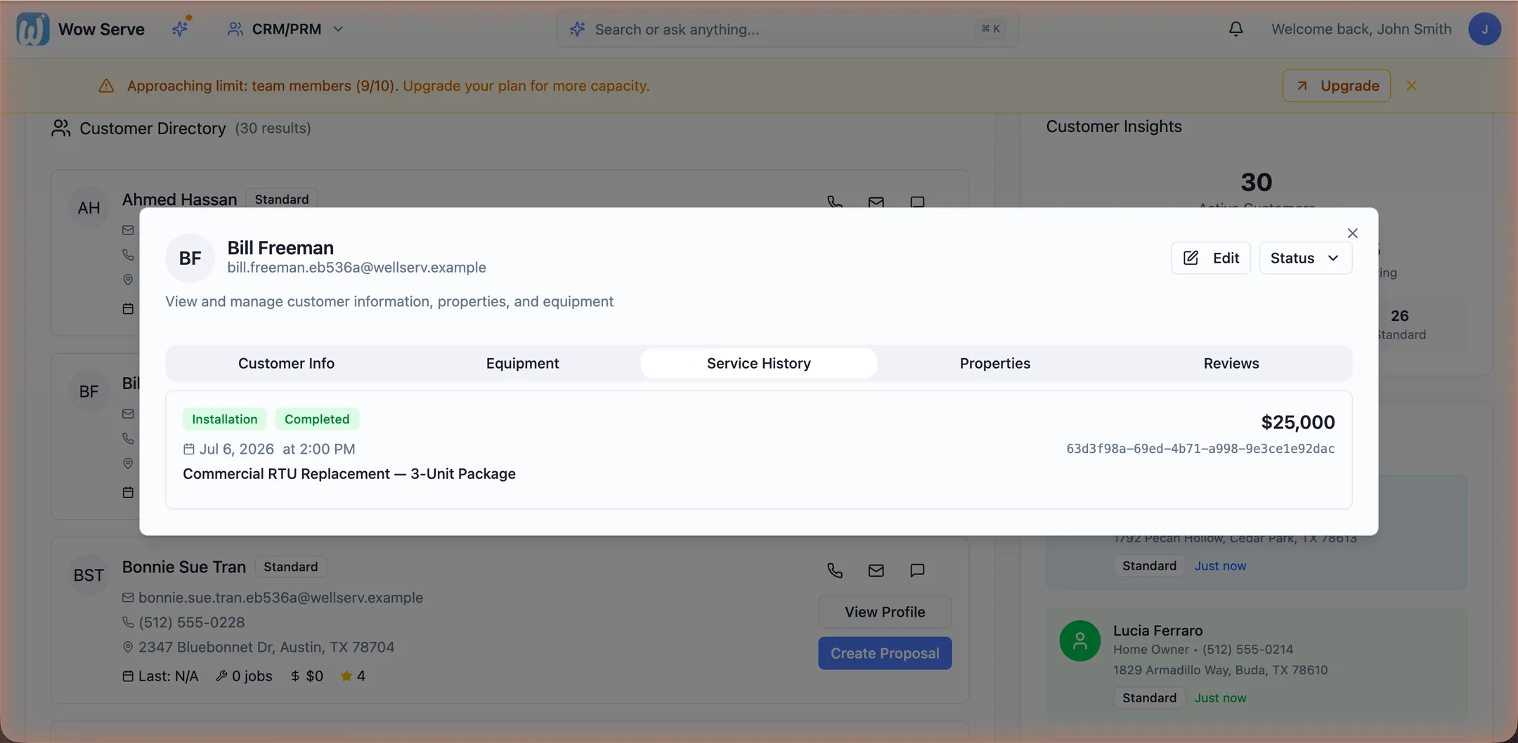 Customer profile with service history — a completed $25,000 commercial installation — plus equipment, properties and reviews tabs